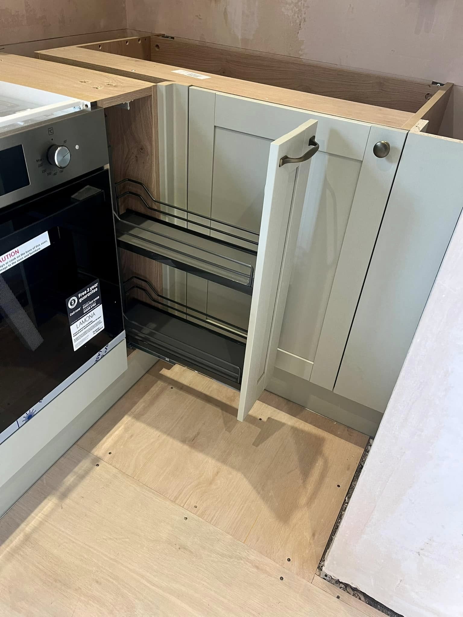Custom kitchen in Edinburgh featuring sleek cabinetry and smart storage solutions by SJC Joinery (Scot) Ltd