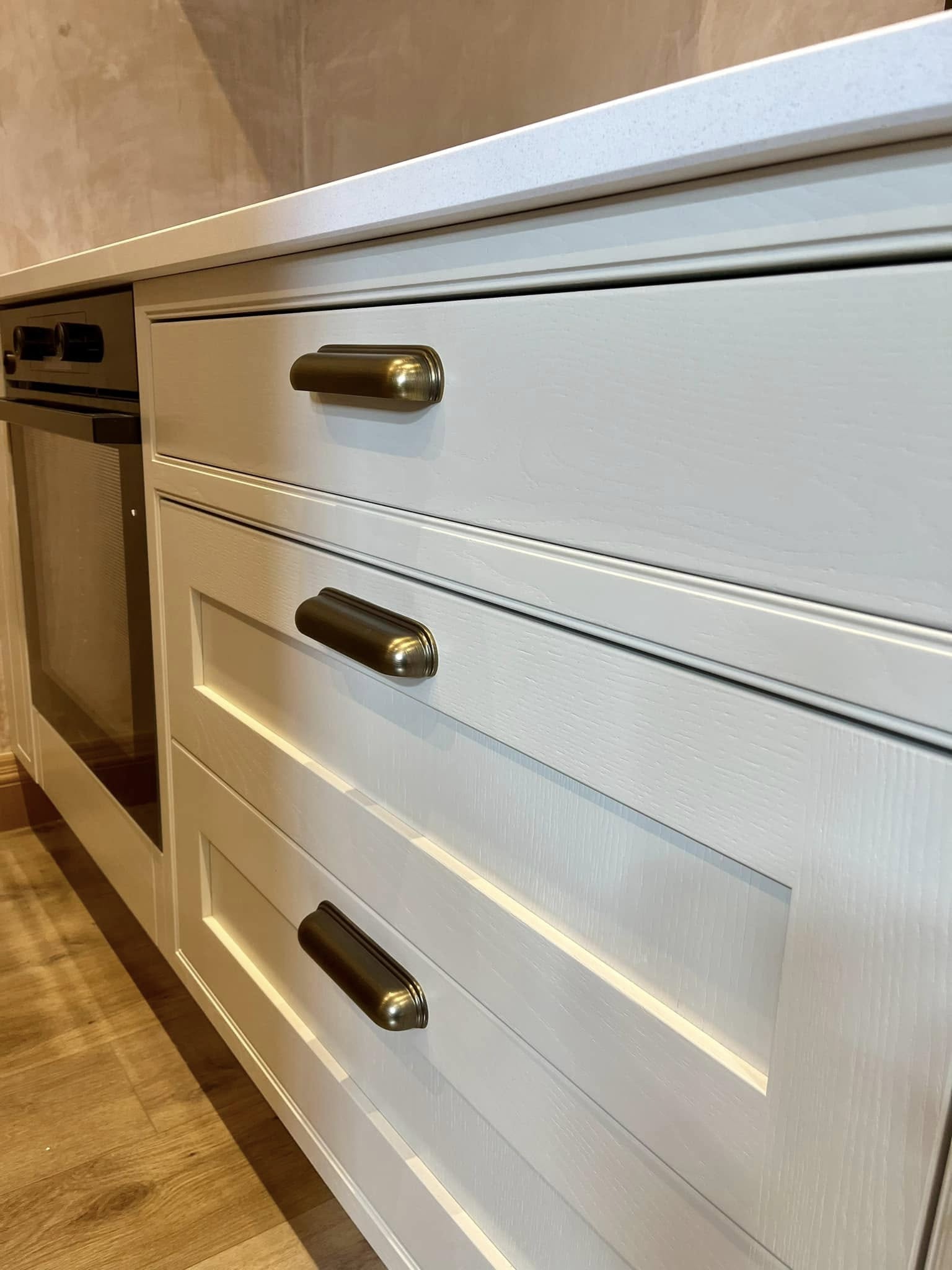 Custom kitchen in Edinburgh featuring sleek cabinetry and smart storage solutions by SJC Joinery (Scot) Ltd
