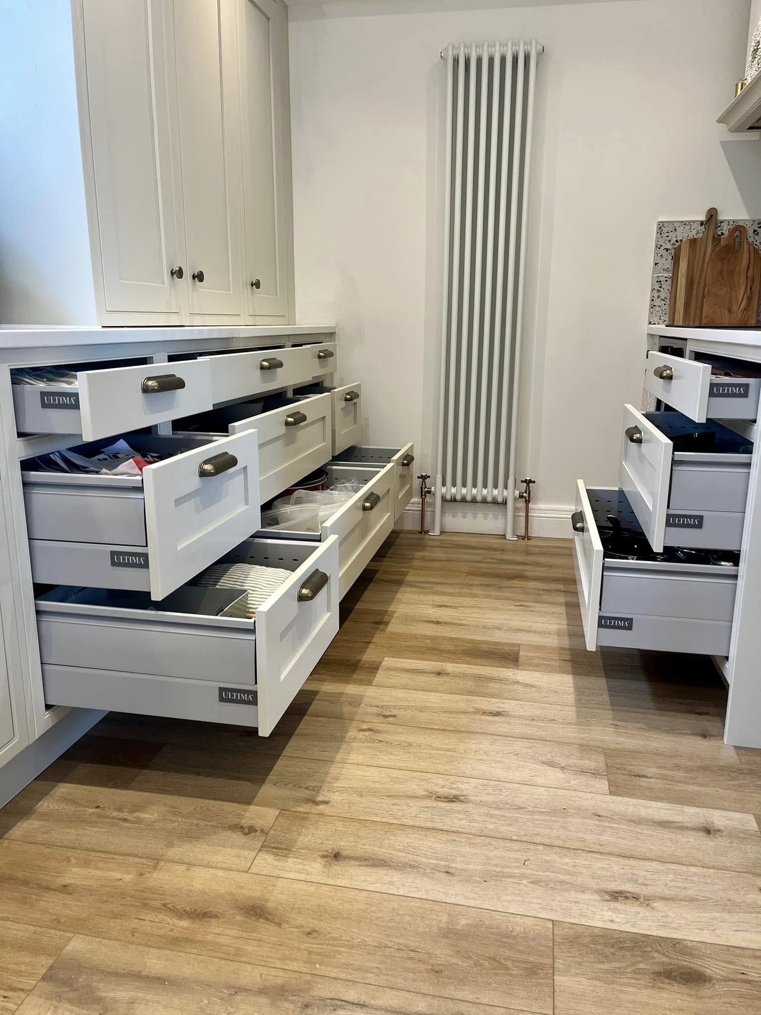 Bespoke kitchen in Edinburgh with integrated storage, elegant finishes, and LED lighting by SJC Joinery (Scot) Ltd