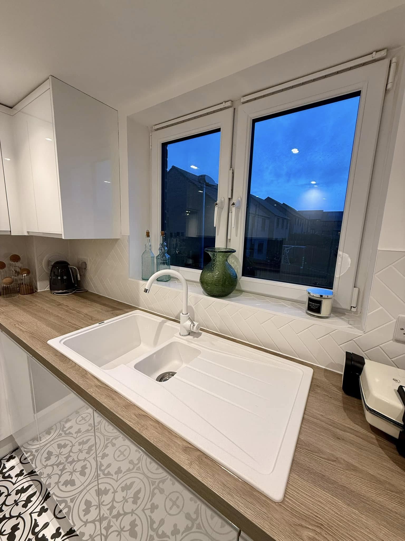 Handcrafted kitchen in Edinburgh home with ambient lighting and durable worktops