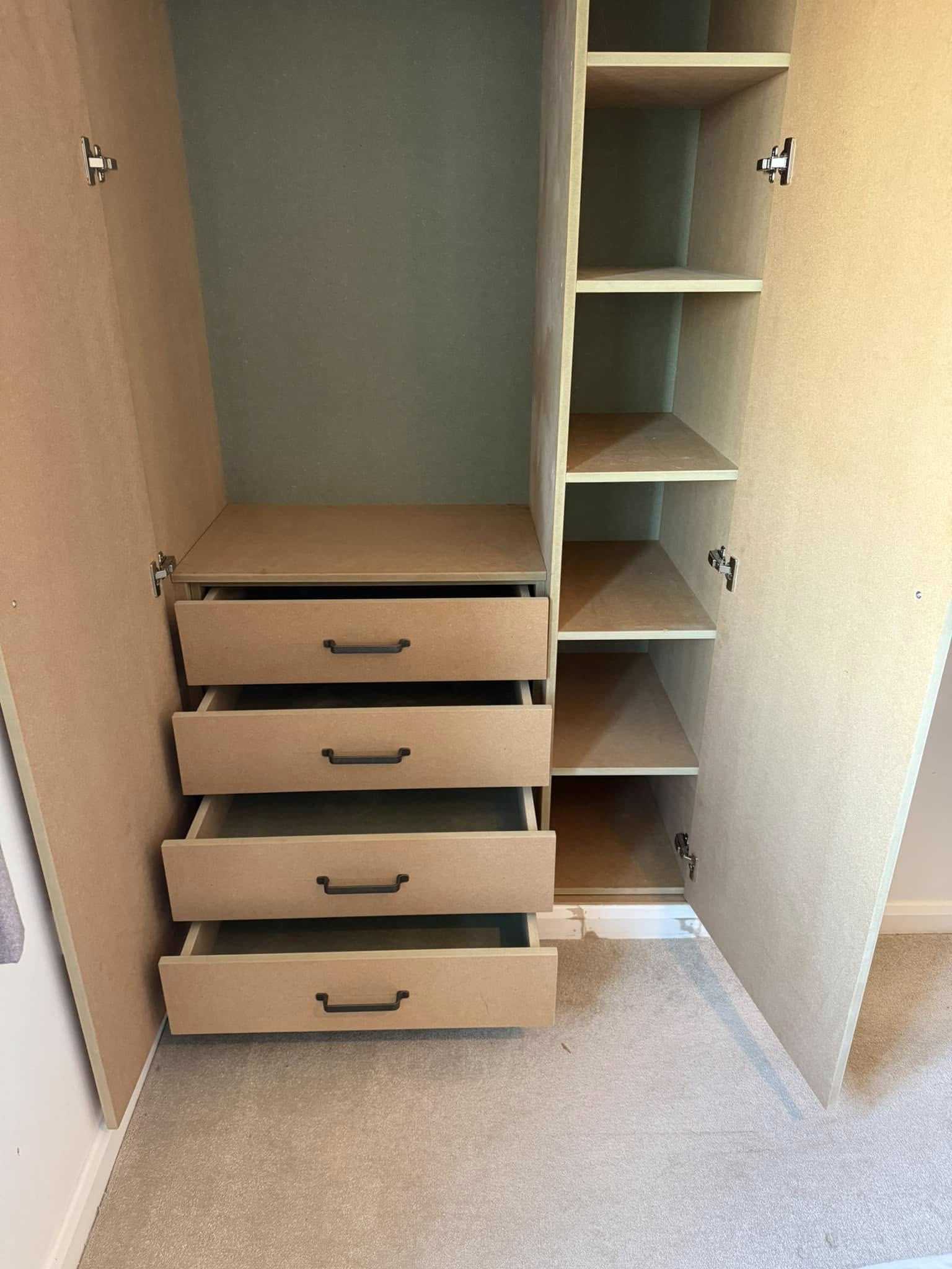 Modern fitted wardrobe design in Edinburgh home maximizing storage space