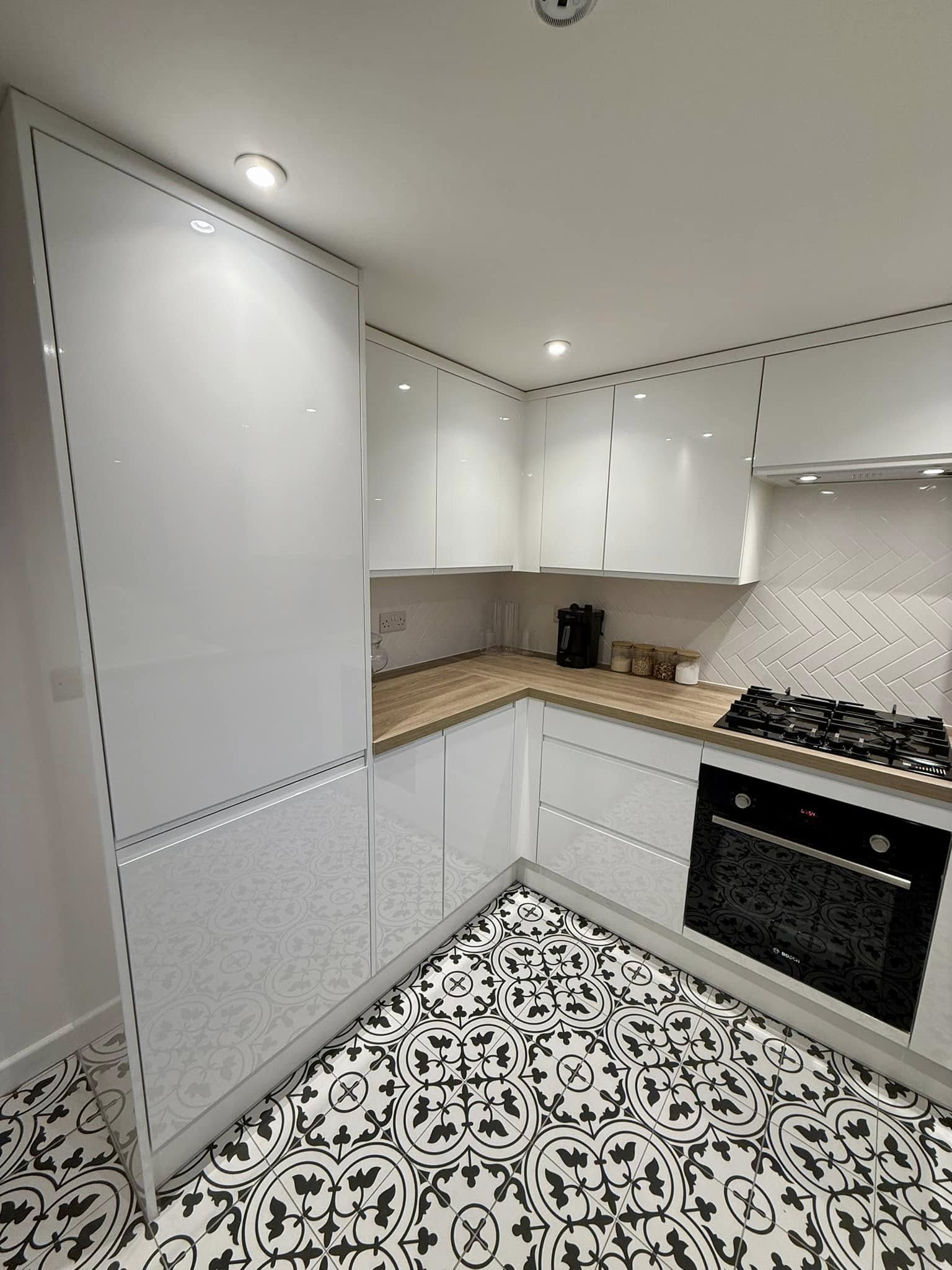 Bespoke kitchen in Edinburgh with integrated storage, elegant finishes, and LED lighting by SJC Joinery (Scot) Ltd