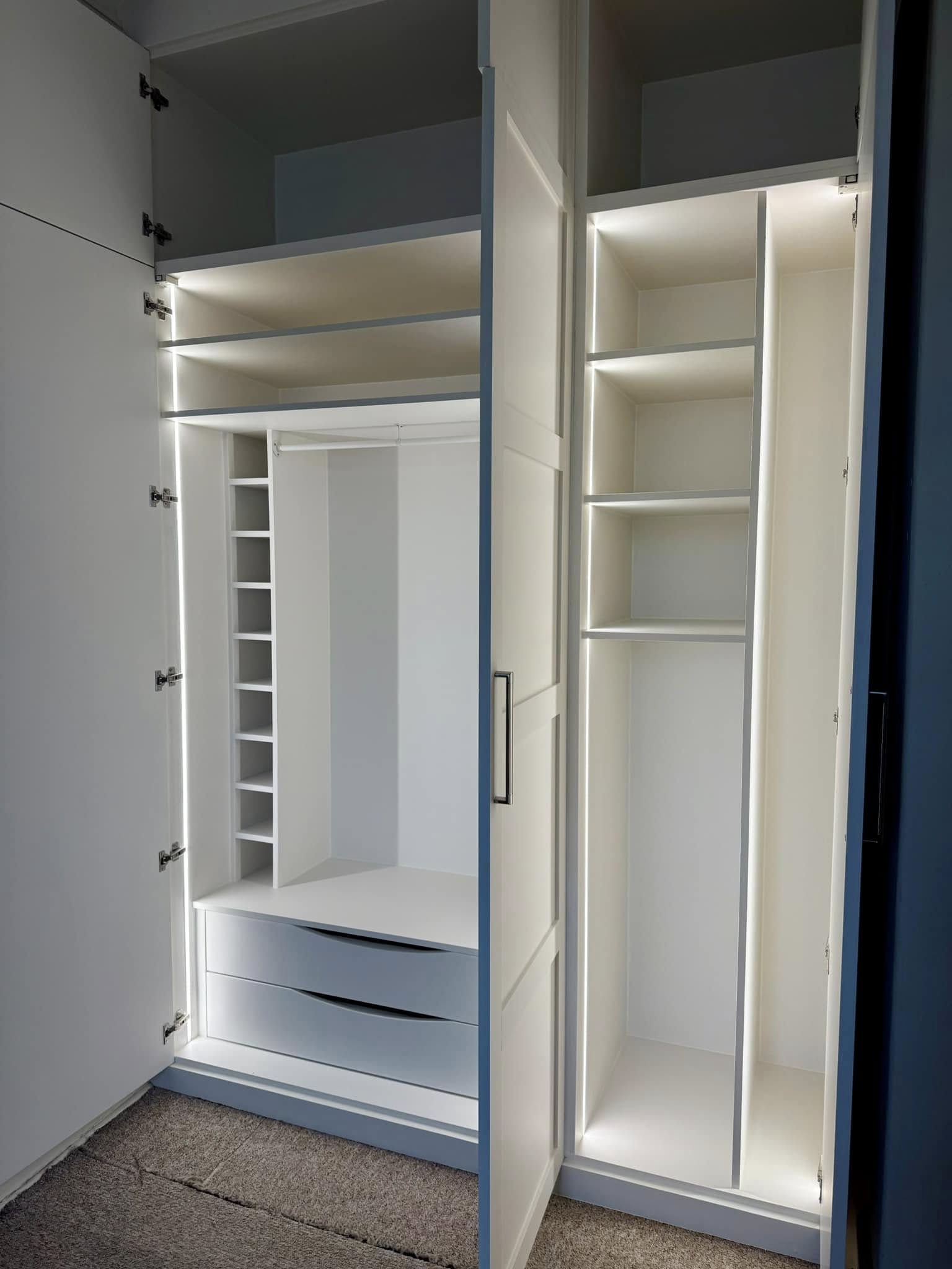 Tailored bedroom wardrobe in Edinburgh with organized shelves and hanging space