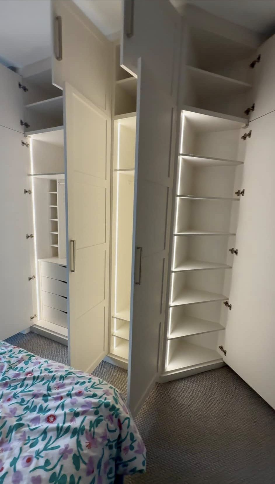 Modern fitted wardrobe design in Edinburgh home maximizing storage space