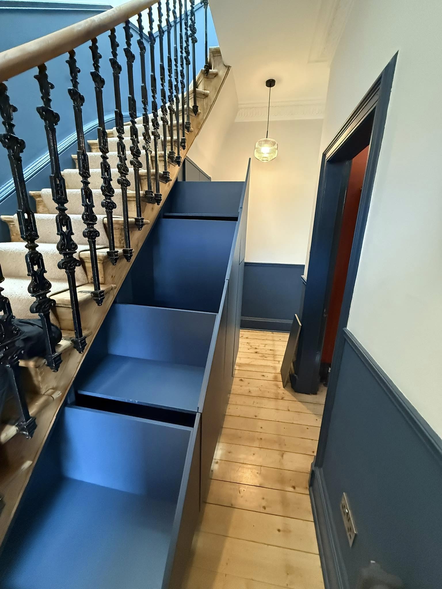 Tailored bedroom wardrobe in Edinburgh with organized shelves and hanging space