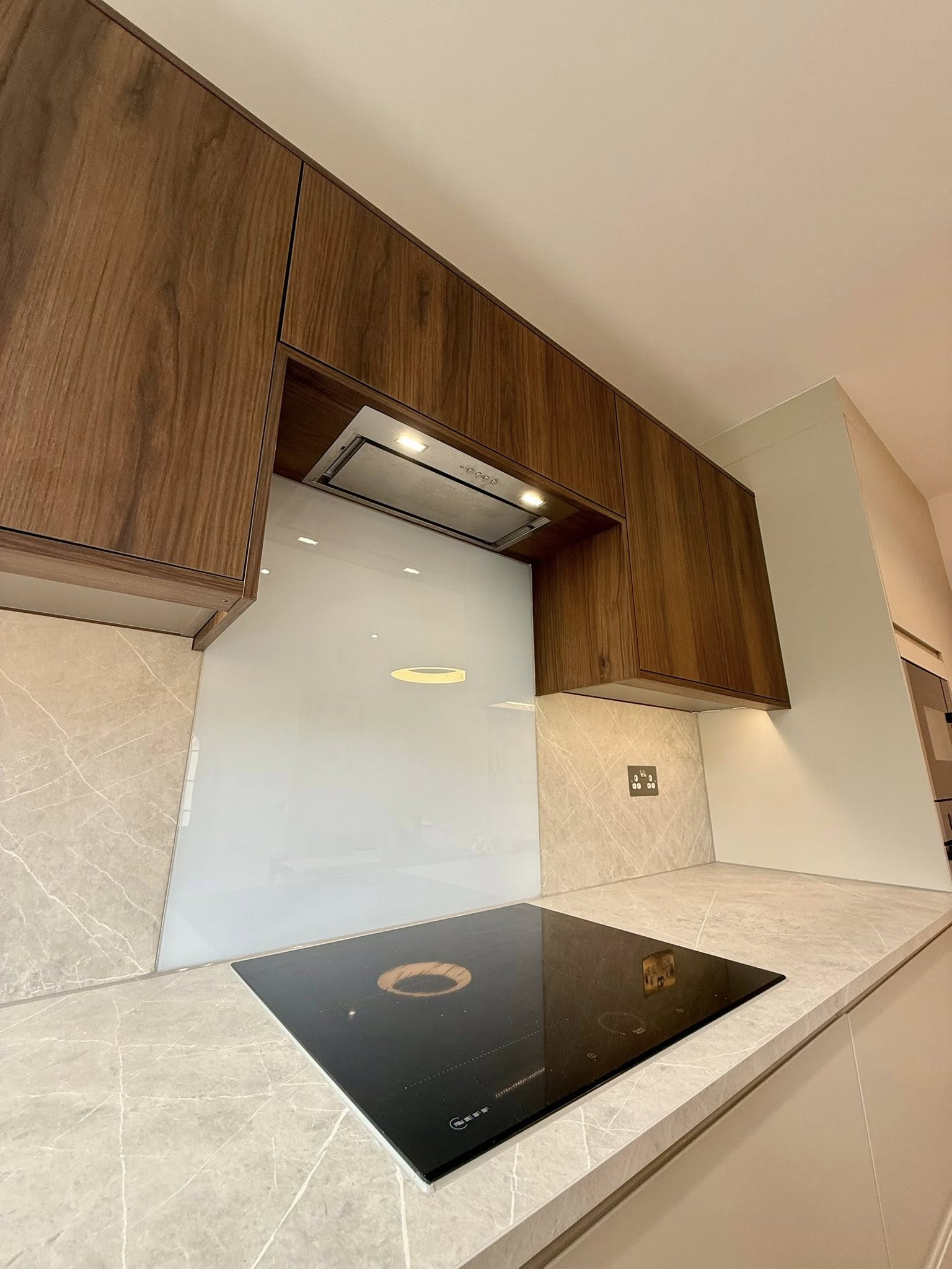 Bespoke kitchen in Edinburgh with integrated storage, elegant finishes, and LED lighting by SJC Joinery (Scot) Ltd