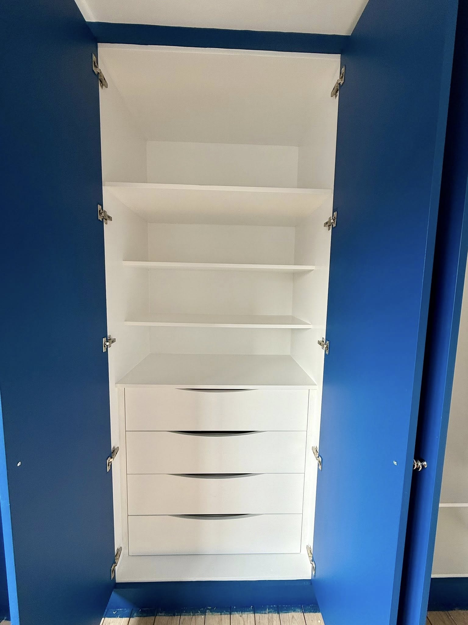 Handcrafted wardrobe with elegant finishes in Edinburgh property by SJC Joinery (Scot) Ltd