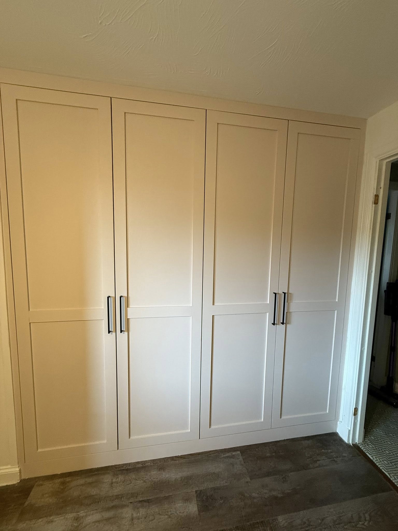 Handcrafted wardrobe with elegant finishes in Edinburgh property by SJC Joinery (Scot) Ltd