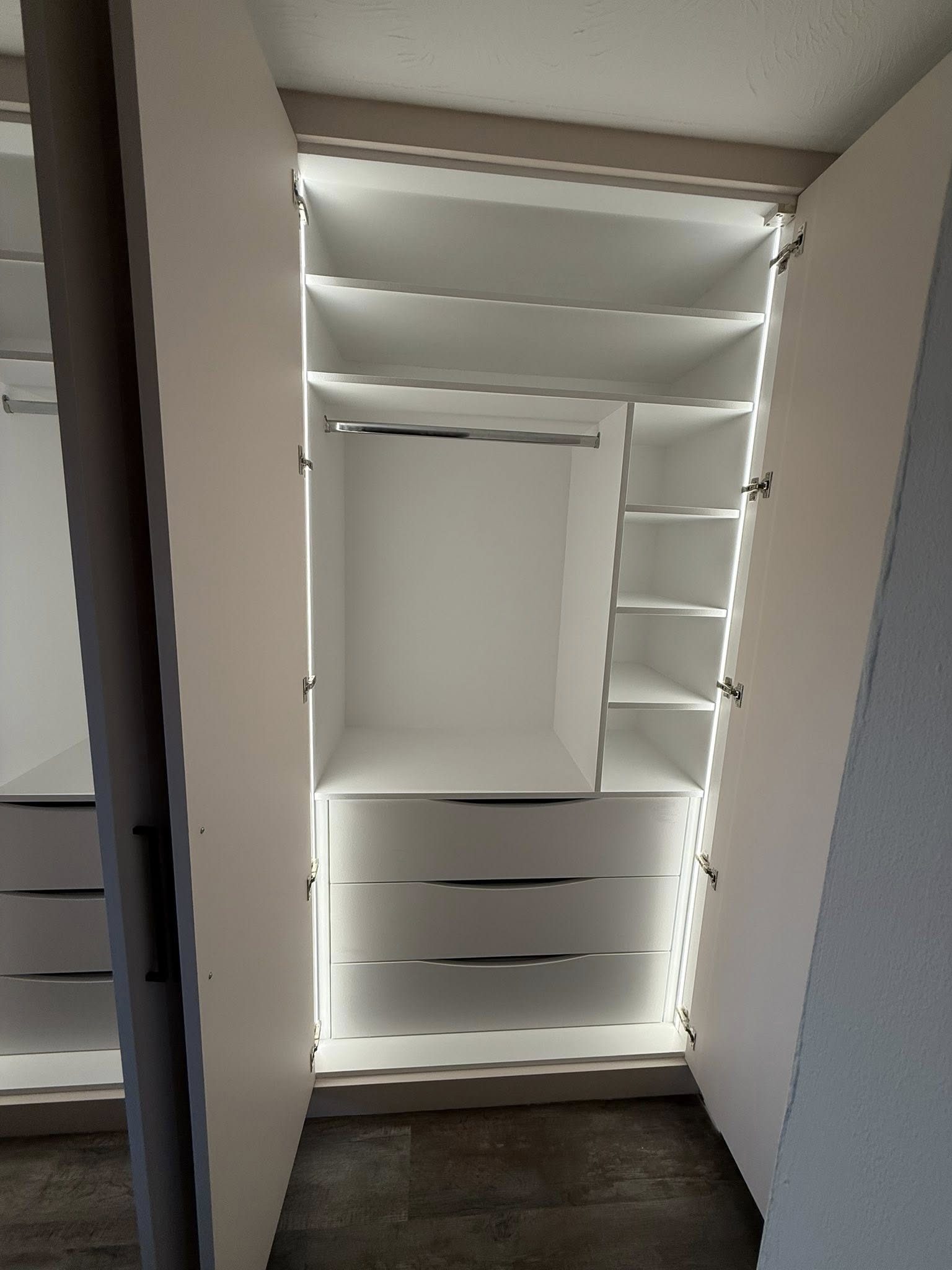 Modern fitted wardrobe design in Edinburgh home maximizing storage space