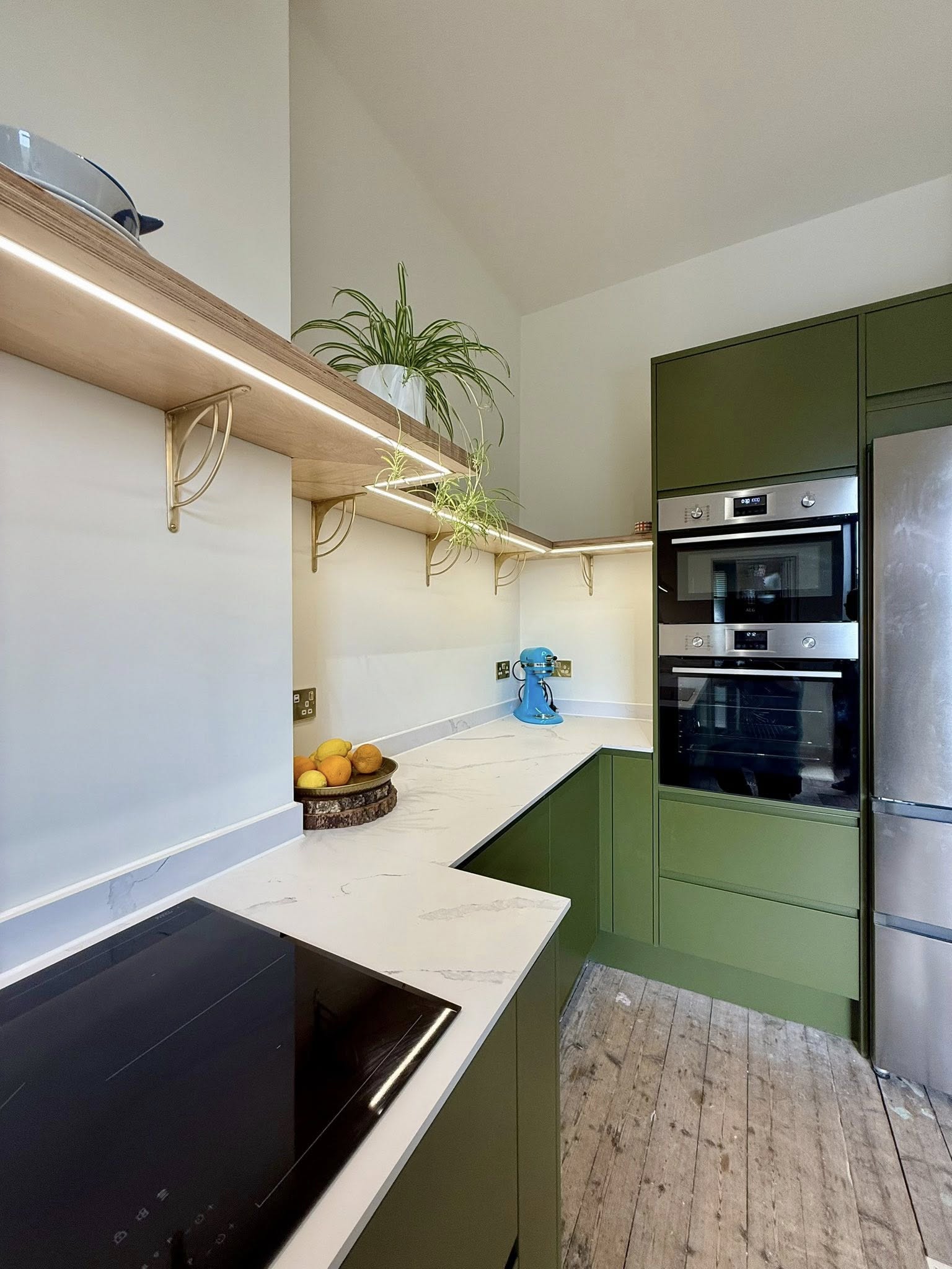 Bespoke kitchen in Edinburgh with integrated storage, elegant finishes, and LED lighting by SJC Joinery (Scot) Ltd