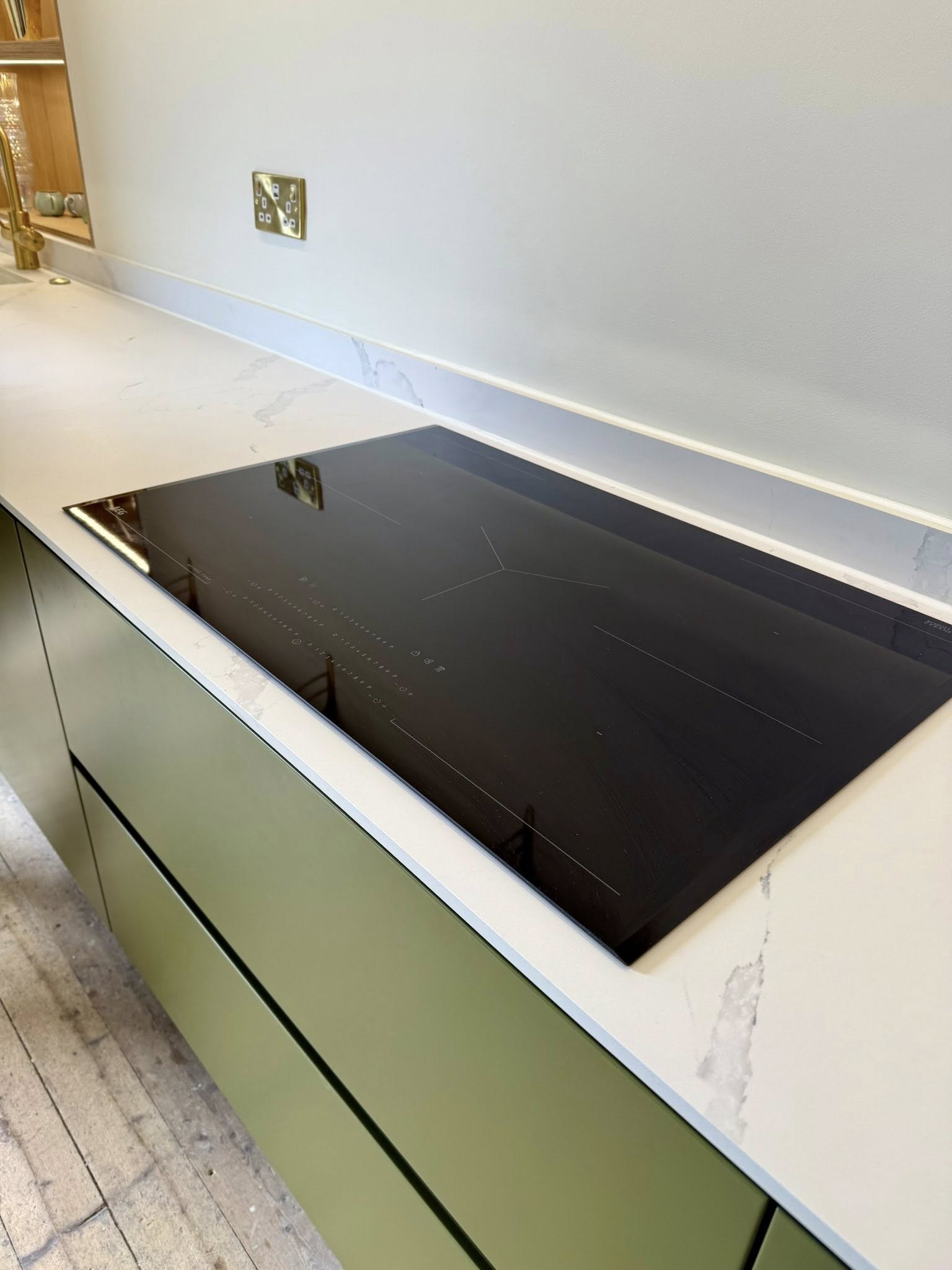 Handcrafted kitchen in Edinburgh home with ambient lighting and durable worktops