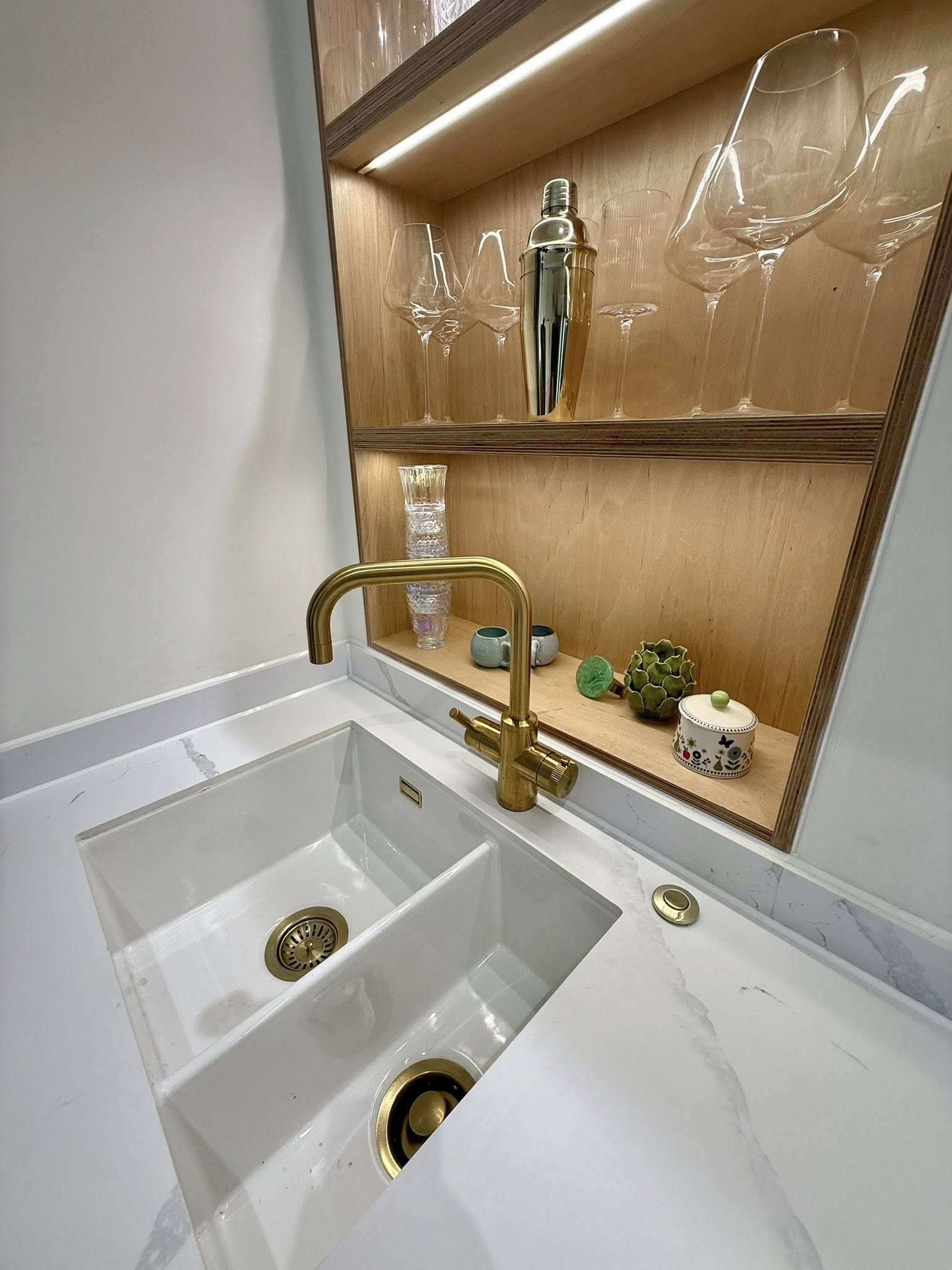 Handcrafted kitchen in Edinburgh home with ambient lighting and durable worktops